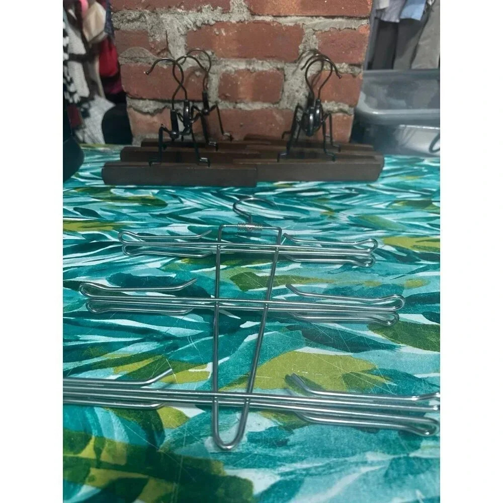 6 Wooden, 1 Metal Clothing Hangers